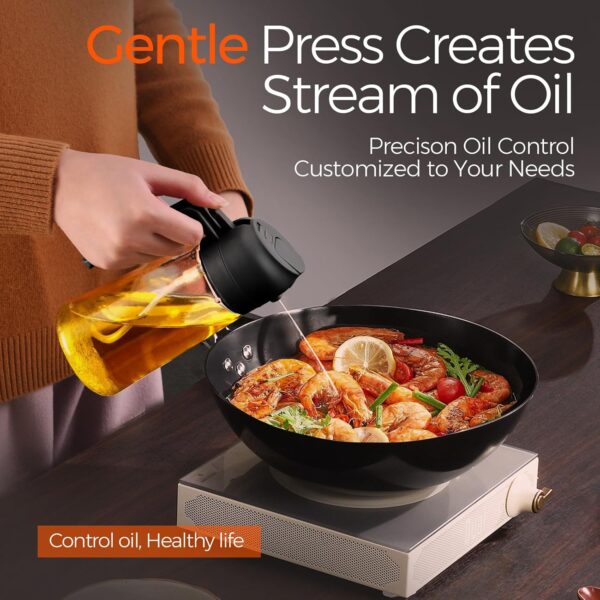 OilSync™ oil dispenser gentle sparying cooking oil into a plate of food