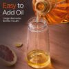 OilSync™ refillable glass oil dispenser with easy to add oil design