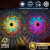 MandaGlow™ solar mandala wall lights creating colourful decorative patterns on an outdoor fence