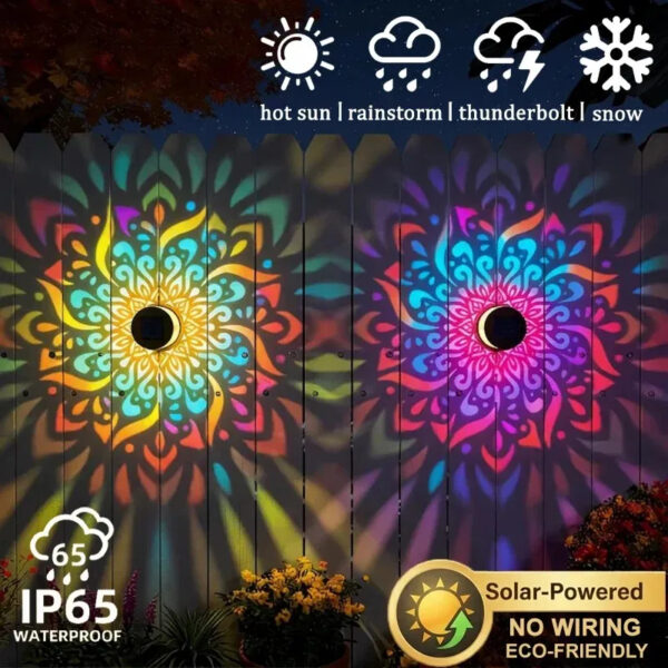 MandaGlow™ solar mandala wall lights creating colourful decorative patterns on an outdoor fence