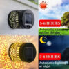 Multiple MandaGlow™ decorative solar lights projecting patterned light across an outdoor patio area